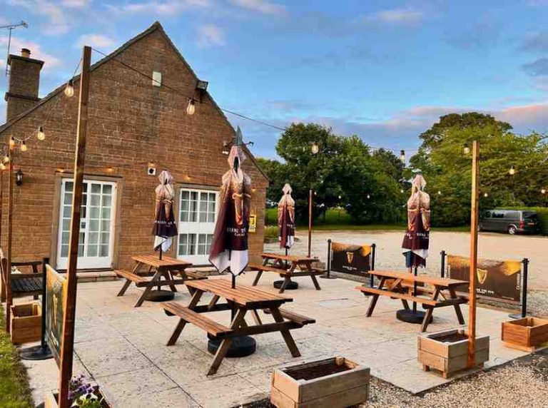 stanton club patio with benches